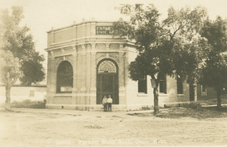 Exterior Shot of the Farmers State Bank from the early 1900's. Now Pathway Bank